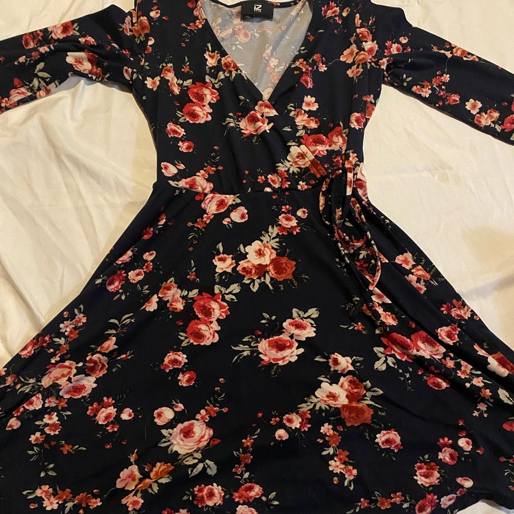 Low cut Navy Blue dress with flower pattern, knee-length